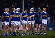 26 February 2022; Tipperary players including Seamus Callanan, right, stand for the national anthem before the Allianz Hurling League Division 1 Group B match between Tipperary and Dublin at FBD Semple Stadium in Thurles, Tipperary. Photo by David Fitzgerald/Sportsfile