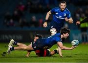 25 February 2022; Max O'Reilly of Leinster is tackled by Stean Pienaar of Emirates Lions during the United Rugby Championship match between Leinster and Emirates Lions at the RDS Arena in Dublin. Photo by Seb Daly/Sportsfile