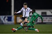 28 February 2022; Dan Williams of Dundalk is tackled by Élie-Gaël N'Zeyi Kibonge of Finn Harps during the SSE Airtricity League Premier Division match between Dundalk and Finn Harps at Oriel Park in Dundalk, Louth. Photo by Ramsey Cardy/Sportsfile