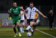 28 February 2022; Robbie Benson of Dundalk is tackled by Ethan Boyle of Finn Harps during the SSE Airtricity League Premier Division match between Dundalk and Finn Harps at Oriel Park in Dundalk, Louth. Photo by Ramsey Cardy/Sportsfile