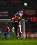 28 February 2022; Promise Omochere of Bohemians in action against Joe Redmond of St Patrick's Athletic during the SSE Airtricity League Premier Division match between Bohemians and St Patrick's Athletic at Dalymount Park in Dublin. Photo by Eóin Noonan/Sportsfile