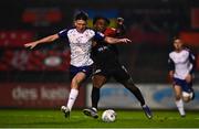 28 February 2022; Joe Redmond of St Patrick's Athletic in action against Promise Omochere of Bohemians during the SSE Airtricity League Premier Division match between Bohemians and St Patrick's Athletic at Dalymount Park in Dublin. Photo by Eóin Noonan/Sportsfile