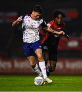 28 February 2022; Joe Redmond of St Patrick's Athletic in action against Promise Omochere of Bohemians during the SSE Airtricity League Premier Division match between Bohemians and St Patrick's Athletic at Dalymount Park in Dublin. Photo by Eóin Noonan/Sportsfile