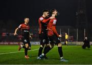 28 February 2022; Stephen Mallon, right, celebrates with Bohemians teammates Dawson Devoy and Tyreke Wilson, left, after scoring their first goal during the SSE Airtricity League Premier Division match between Bohemians and St Patrick's Athletic at Dalymount Park in Dublin. Photo by Eóin Noonan/Sportsfile