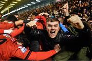 28 February 2022; Bohemians supporters celebrate with players after Stephen Mallon scored their first goal during the SSE Airtricity League Premier Division match between Bohemians and St Patrick's Athletic at Dalymount Park in Dublin. Photo by Eóin Noonan/Sportsfile