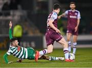 28 February 2022; Jack Byrne of Shamrock Rovers slides in to tackle James Clarke of Drogheda United during the SSE Airtricity League Premier Division match between Shamrock Rovers and Drogheda United at Tallaght Stadium in Dublin. Photo by Piaras Ó Mídheach/Sportsfile
