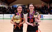 1 March 2022; Piper's Hill captain Olivia Miley, right, and MVP Niamh Farrelly celebrate after the Basketball Ireland U19C Girls Schools League Final match between Piper's Hill Naas, Kildare and St. Finians Swords, Dublin at the National Basketball Arena in Dublin. Photo by Brendan Moran/Sportsfile