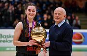 1 March 2022; Niamh Farrelly of St Finian's is presented with the MVP by Baskeball Ireland southwest regional organiser Ger Tarrant after the Basketball Ireland U19C Girls Schools League Final match between Piper's Hill Naas, Kildare and St. Finians Swords, Dublin at the National Basketball Arena in Dublin. Photo by Brendan Moran/Sportsfile