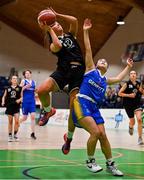 1 March 2022; Paris Nic Cárthaigh of Gaelcholáiste Tralee in action against Amy Shannon of St Louis during the Basketball Ireland U19B Girls Schools League Final match between St. Louis Kiltimagh, Mayo and Gaelcholáiste Tralee, Kerry at National Basketball Arena in Dublin. Photo by Brendan Moran/Sportsfile