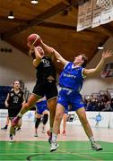 1 March 2022; Paris Nic Cárthaigh of Gaelcholáiste Tralee is fouled in the act of shooting by Lucy Brennan of St Louis during the Basketball Ireland U19B Girls Schools League Final match between St. Louis Kiltimagh, Mayo and Gaelcholáiste Tralee, Kerry at National Basketball Arena in Dublin. Photo by Brendan Moran/Sportsfile