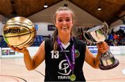 1 March 2022; Gaelcholáiste Tralee captain Paris Nic Cárthaigh celebrates with her MVP award and the cup after the Basketball Ireland U19B Girls Schools League Final match between St. Louis Kiltimagh, Mayo and Gaelcholáiste Tralee, Kerry at National Basketball Arena in Dublin. Photo by Brendan Moran/Sportsfile