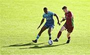 1 March 2022; Phil Hynes of NUI Galway B in action against Gilles Foka of TU Dublin City Campus during the CUFL Men's Division Two Final match between NUI Galway B and TU Dublin City Campus at Athlone Town Stadium in Athlone, Westmeath. Photo by Ramsey Cardy/Sportsfile