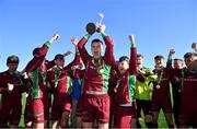 1 March 2022; NUI Galway B captain Phil Hynes lifts the cup after the CUFL Men's Division Two Final match between NUI Galway B and TU Dublin City Campus at Athlone Town Stadium in Athlone, Westmeath. Photo by Ramsey Cardy/Sportsfile