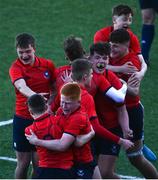 1 March 2022; St Michaels players celebrate at the final whistle after the Bank of Ireland Leinster Rugby Schools Junior Cup 1st Round match between St Vincent’s Castleknock College, Dublin, and St Michael’s College, Dublin, at Energia Park in Dublin. Photo by David Fitzgerald/Sportsfile