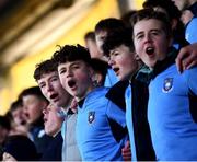 1 March 2022; St Michaels supporters sing after their side's victory in the Bank of Ireland Leinster Rugby Schools Junior Cup 1st Round match between St Vincent’s Castleknock College, Dublin, and St Michael’s College, Dublin, at Energia Park in Dublin. Photo by David Fitzgerald/Sportsfile