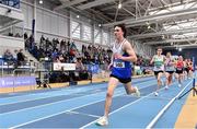 26 February 2022; Marcus Clarke of Ratoath AC, Meath, competing in the senior men's 3000m during day one of the Irish Life Health National Senior Indoor Athletics Championships at the National Indoor Arena at the Sport Ireland Campus in Dublin. Photo by Sam Barnes/Sportsfile