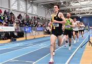 26 February 2022; Thomas Moran of Dunshaughlin AC, Meath, competing in the senior men's 3000m during day one of the Irish Life Health National Senior Indoor Athletics Championships at the National Indoor Arena at the Sport Ireland Campus in Dublin. Photo by Sam Barnes/Sportsfile