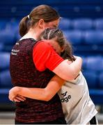 1 March 2022; Sarah Ní Scannláin of Gaelcholáiste Tralee is consoled by her coach Sinéad Ní Chathasaigh after the Basketball Ireland U16B Girls Schools League Final match between Gaelcholáiste Tralee, Kerry and Intermediate School Killorglin, Kerry at the National Basketball Arena in Dublin. Photo by Brendan Moran/Sportsfile