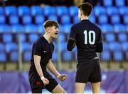1 March 2022; Christopher MacLachlann Hickey of Wesley College, right, is congratulated by team mate Jack Freyne after he kicked the match winning penalty during the Bank of Ireland Leinster Rugby Schools Junior Cup 1st Round match between Belvedere College, Dublin, and Wesley College, Dublin, at Energia Park in Dublin. Photo by David Fitzgerald/Sportsfile