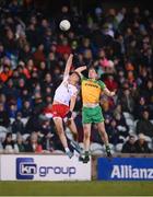 26 February 2022; Conn Kilpatrick of Tyrone in action against Ciaran Thompson of Donegal during the Allianz Football League Division 1 match between Donegal and Tyrone at MacCumhaill Park in Ballybofey, Donegal. Photo by Stephen McCarthy/Sportsfile