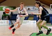 2 March 2022; Sean Connolly of Skibbereen in action against Rory McParland of Rathmore during the Basketball Ireland U16B Boys Schools League Final match between Skibbereen Community School, Cork, and Rathmore Grammar School, Belfast, at the National Basketball Arena in Dublin. Photo by Seb Daly/Sportsfile
