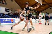 2 March 2022; Naoise Quinn of Skibbereen in action against Eoghan Sherry of Rathmore during the Basketball Ireland U16B Boys Schools League Final match between Skibbereen Community School, Cork, and Rathmore Grammar School, Belfast, at the National Basketball Arena in Dublin. Photo by Seb Daly/Sportsfile