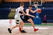 2 March 2022; Jacob Byrne of Rathmore in action against Ruairi Collins of Skibbereen during the Basketball Ireland U16B Boys Schools League Final match between Skibbereen Community School, Cork, and Rathmore Grammar School, Belfast, at the National Basketball Arena in Dublin. Photo by Seb Daly/Sportsfile