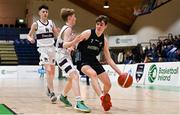 2 March 2022; Jacob Byrne of Rathmore in action against Finn Brickley of Skibbereen during the Basketball Ireland U16B Boys Schools League Final match between Skibbereen Community School, Cork, and Rathmore Grammar School, Belfast, at the National Basketball Arena in Dublin. Photo by Seb Daly/Sportsfile