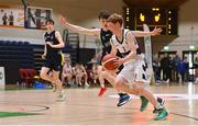 2 March 2022; Finn Brickley of Skibbereen in action against Conn Rush of Rathmore during the Basketball Ireland U16B Boys Schools League Final match between Skibbereen Community School, Cork, and Rathmore Grammar School, Belfast, at the National Basketball Arena in Dublin. Photo by Seb Daly/Sportsfile