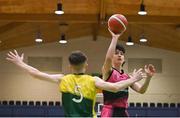 2 March 2022; Patryk Rejowicz of St Munchin's in action against Niall Coggins of Gortnor Abbey during the Basketball Ireland U19B Boys Schools League Final match between Gortnor Abbey Secondary School, Mayo, and St Munchin's College, Limerick, at the National Basketball Arena in Dublin. Photo by Seb Daly/Sportsfile