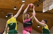 2 March 2022; Reece Barry of St Munchin's in action against Niall Coggins, left, and Conor Barrett of Gortnor Abbey during the Basketball Ireland U19B Boys Schools League Final match between Gortnor Abbey Secondary School, Mayo, and St Munchin's College, Limerick, at the National Basketball Arena in Dublin. Photo by Seb Daly/Sportsfile