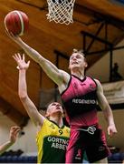 2 March 2022; Eoin Price of St Munchin's in action against Conor Barrett of Gortnor Abbey during the Basketball Ireland U19B Boys Schools League Final match between Gortnor Abbey Secondary School, Mayo, and St Munchin's College, Limerick, at the National Basketball Arena in Dublin. Photo by Seb Daly/Sportsfile