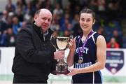 3 March 2022; Mercy Waterford captain Sarah Hickey is presented the cup Basketball Ireland president PJ Reidy after the Basketball Ireland U19A Girls Schools League Final match between Loreto Kilkenny and Mercy Waterford at the National Basketball Arena in Dublin. Photo by Ben McShane/Sportsfile