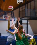 3 March 2022; Anna Coogan of Regina Mundi goes for a layup despite the attention of Aisling Jordan of Calasanctius College during the Basketball Ireland U16A Girls Schools League Final match between Calasanctius College, Galway and Regina Mundi, Cork at the National Basketball Arena in Dublin. Photo by Ben McShane/Sportsfile