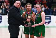 3 March 2022; Basketball Ireland president PJ Reidy presents Calasanctius College co-captains Naoise Ní Bhroin, centre, and Laoise Quinn with the cup after the Basketball Ireland U16A Girls Schools League Final match between Calasanctius College, Galway and Regina Mundi, Cork at the National Basketball Arena in Dublin. Photo by Ben McShane/Sportsfile