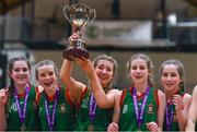 3 March 2022; Calasanctius College co-captain Naoise Ní Bhroin, centre, with the cup after the Basketball Ireland U16A Girls Schools League Final match between Calasanctius College, Galway and Regina Mundi, Cork at the National Basketball Arena in Dublin. Photo by Ben McShane/Sportsfile