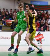 3 March 2022; Cillian Cannon of Calasanctius College in action against Conor Moynihan of SPSL Rathmore during the Basketball Ireland U16A Boys Schools League Final match between Calasanctius College, Galway and SPSL Rathmore, Kerry at the National Basketball Arena in Dublin. Photo by Ben McShane/Sportsfile