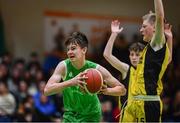 3 March 2022; Tiarnan Keane of Calasanctius College gets past James Twomey of SPSL Rathmore during the Basketball Ireland U16A Boys Schools League Final match between Calasanctius College, Galway and SPSL Rathmore, Kerry at the National Basketball Arena in Dublin. Photo by Ben McShane/Sportsfile