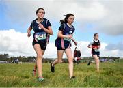 3 March 2022; Doireann Barry, left, and Mia Woods of St Marys Midleton, competing in the minor girls 2000m during the Irish Life Health Munster Schools Cross Country Championships at Riverstick, Boulaling, Cork. Photo by David Fitzgerald/Sportsfile