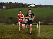 3 March 2022; Rian Kenny O'Sullivan of Mercy Mount Hawk Tralee, right, and Jimmy Gallagher of Kilrush CS, competing in the senior boys 6000m during the Irish Life Health Munster Schools Cross Country Championships at Riverstick, Boulaling, Cork. Photo by David Fitzgerald/Sportsfile