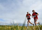3 March 2022; Molly Fagan, left, and Laura Larder of Loreto Fermoy, competing in the senior girls 3000m during the Irish Life Health Munster Schools Cross Country Championships at Riverstick, Boulaling, Cork. Photo by David Fitzgerald/Sportsfile