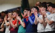 3 March 2022; St Joseph's supporters celebrate a score during the Basketball Ireland U19A Boys Schools League Final match between Coláiste Eanna, Dublin and St. Joseph's, Galway at the National Basketball Arena in Dublin. Photo by Ben McShane/Sportsfile