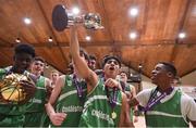 3 March 2022; Coláiste Eanna captain Shanay Shah celebrates with the cup with his teammates after the Basketball Ireland U19A Boys Schools League Final match between Coláiste Eanna, Dublin and St. Joseph's, Galway at the National Basketball Arena in Dublin. Photo by Ben McShane/Sportsfile