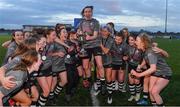 3 March 2022; NUI Galway captain Chloe Singleton, centre, celebrates with the cup alongside teammates after their side's victory in the CUFL Women's Premier Division Final match between NUI Galway and Ulster University at Athlone Town Stadium in Westmeath. Photo by Seb Daly/Sportsfile