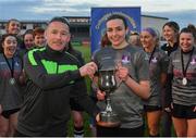 3 March 2022; NUI Galway captain Chloe Singleton is presented with the cup by Robert Oldham, WSCAI, following her side's victory in the CUFL Women's Premier Division Final match between NUI Galway and Ulster University at Athlone Town Stadium in Westmeath. Photo by Seb Daly/Sportsfile