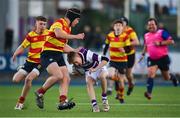 4 March 2022; Rossa Williams of Clongowes Wood College is tackled by Lucas O’Gorman of Temple Carrig during the Bank of Ireland Leinster Rugby Schools Junior Cup 1st Round match between Temple Carrig, Wicklow and Clongowes Wood College, Kildare at Energia Park in Dublin. Photo by Daire Brennan/Sportsfile