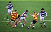 4 March 2022; Ross Doyle of Clongowes Wood College is tackled by Shane Collins of Temple Carrig during the Bank of Ireland Leinster Rugby Schools Junior Cup 1st Round match between Temple Carrig, Wicklow and Clongowes Wood College, Kildare at Energia Park in Dublin. Photo by Daire Brennan/Sportsfile