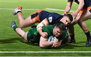 4 March 2022; Peter Sullivan of Connacht scores his side's first try despite the tackle from James Lang of Edinburgh during the United Rugby Championship match between Edinburgh and Connacht at Dam Health Stadium in Edinburgh, Scotland. Photo by Paul Devlin/Sportsfile