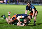 4 March 2022; Peter Sullivan of Connacht scores his side's first try despite the tackle from James Lang of Edinburgh during the United Rugby Championship match between Edinburgh and Connacht at Dam Health Stadium in Edinburgh, Scotland. Photo by Paul Devlin/Sportsfile