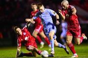 4 March 2022; Brandon Kavanagh of Derry City in action against Luke Byrne, left, and Mark Coyle of Shelbourne during the SSE Airtricity League Premier Division match between Shelbourne and Derry City at Tolka Park in Dublin. Photo by Eóin Noonan/Sportsfile